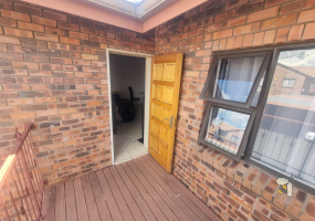 Secunda, flat for sale, spacious apartment, built-in braai, open-plan living, cherry wood kitchen, balcony, professionals, small family