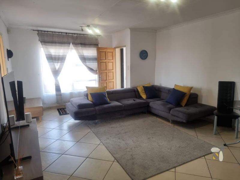 Secunda, flat for sale, spacious apartment, built-in braai, open-plan living, cherry wood kitchen, balcony, professionals, small family