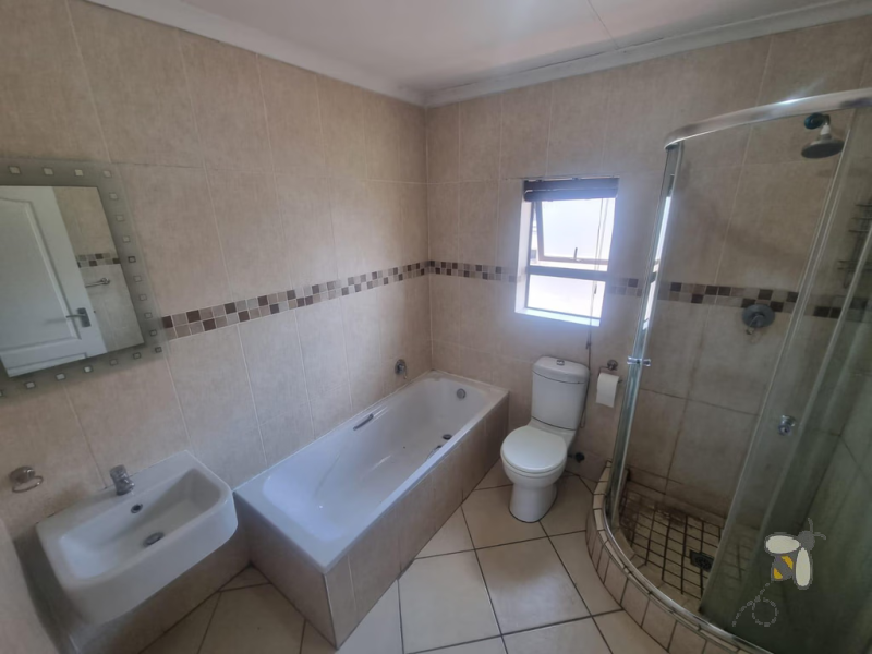 Secunda, flat for sale, spacious apartment, built-in braai, open-plan living, cherry wood kitchen, balcony, professionals, small family