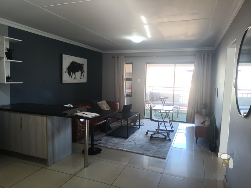 Secunda, apartment for sale, 2 bedroom flat, top floor unit, braai balcony, prepaid electricity, undercover carport, modern kitchen, open plan