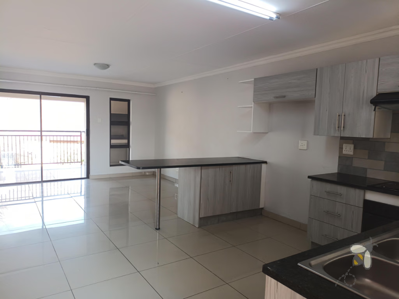 Apartment for sale, 2 bedroom, modern apartment, top floor unit, secure complex, built-in braai, prepaid electricity, undercover carport, low levy