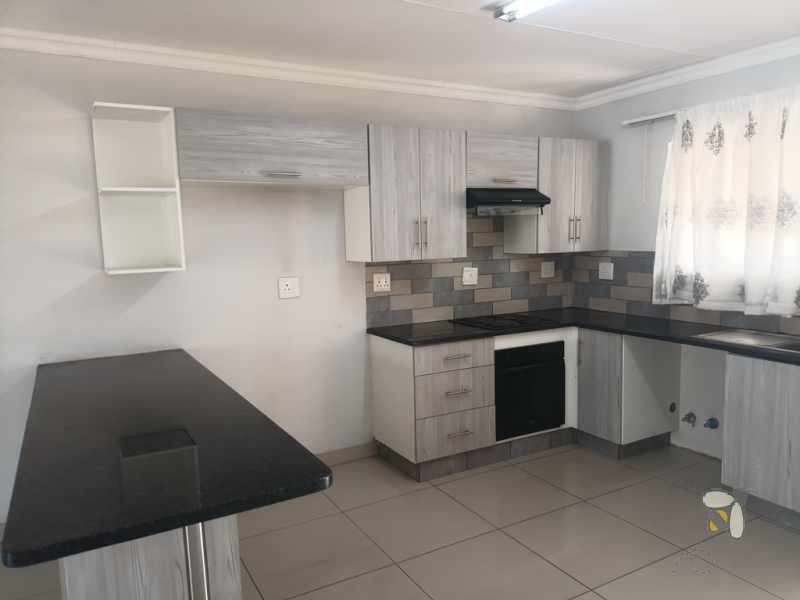 Apartment for sale, 2 bedroom, modern apartment, top floor unit, secure complex, built-in braai, prepaid electricity, undercover carport, low levy