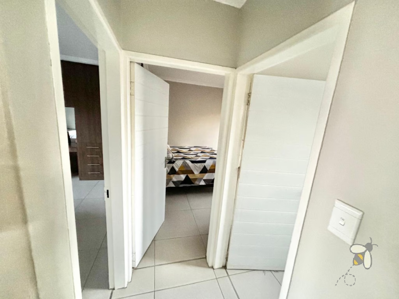 Secunda, apartment for sale, 2 bedroom flat, cozy living, built-in braai, private patio, modern kitchen, shaded parking, well-maintained complex