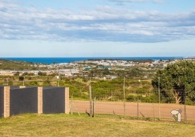 Monte Christo land for sale, vacant stand Monte Christo, Hartenbos Eco Estate stand, coastal plot Garden Route, secure estate land, build-ready stand Monte Christo, beachfront view land, investment stand Mossel Bay, Monte Christo estate plot, Garden Route real estate