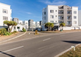 Hartenbos apartment for sale, coastal apartment South Africa, investment property Hartenbos, beach apartment Western Cape, secure estate property, apartment near George Airport, modern apartment Hartenbos