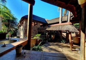 Menkenkop property for sale, thatch roof home George, 3-bedroom house with flatlets Menkenkop, homes with indoor pool George, character home Garden Route, income-generating property Western Cape, dual living property George, luxury home with views Menkenkop