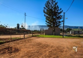 Charming Historic Church Hall with Greenhouses in Trawal, Vredendal – Experience the perfect blend of heritage, charm, and country living in this beautifully converted one-bedroom former church hall. Set on 2.3017 hectares with greenhouses, outdoor facilities, and breathtaking vineyard views, this property offers endless potential for a smallholding, artist’s retreat, or tranquil family home.