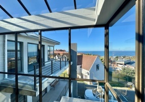 Dana Bay house for sale, 5-bedroom home Dana Bay, luxury coastal property Mossel Bay, Dana Bay real estate, large family home Dana Bay, ocean view house for sale, Garden Route home Dana Bay, Dana Bay investment property