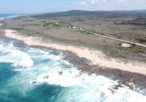 Gouritsmond property for sale, resort zoned land, sea frontage property South Africa, coastal resort land, guest farm for sale, seafront chalets, Western Cape coastal property, farm with water rights, ocean view development property, South African seafront