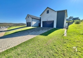 Outeniquasbosch Wildlife Village house for sale, eco-luxury home Hartenbos, 4-bedroom house Mossel Bay, wildlife estate property, solar smart home South Africa, game-viewing house, R9.5m house Hartenbos