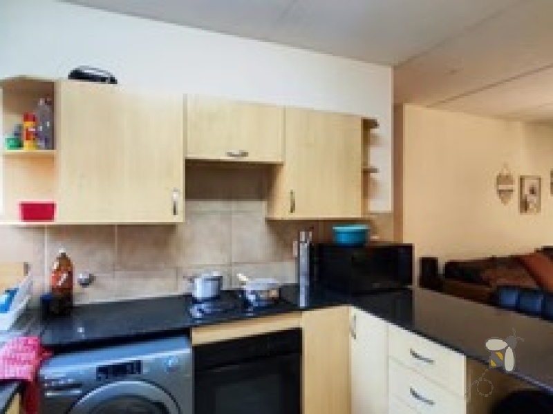 Sonneveld Brakpan property, ground floor unit Sonneveld, affordable townhouse Brakpan, 2 bedroom unit Brakpan, secure complex Brakpan, Chas Everitt Brakpan, Brakpan flats for sale, lock-up garage Brakpan