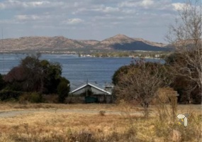 Hartbeespoort vacant land, Hartbeespoort property for sale, 400m² stand Hartbeespoort, secure estate living Hartbeespoort, RE/MAX Infoglobe properties